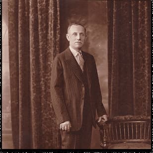 1907 era: vintage portrait placeholder, sepia tone