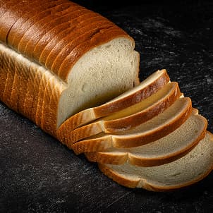 A sliced white bread loaf
