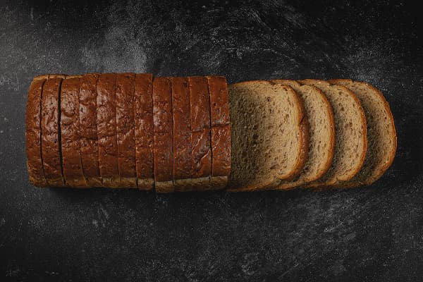 Placeholder image of a sliced whole grain bread loaf